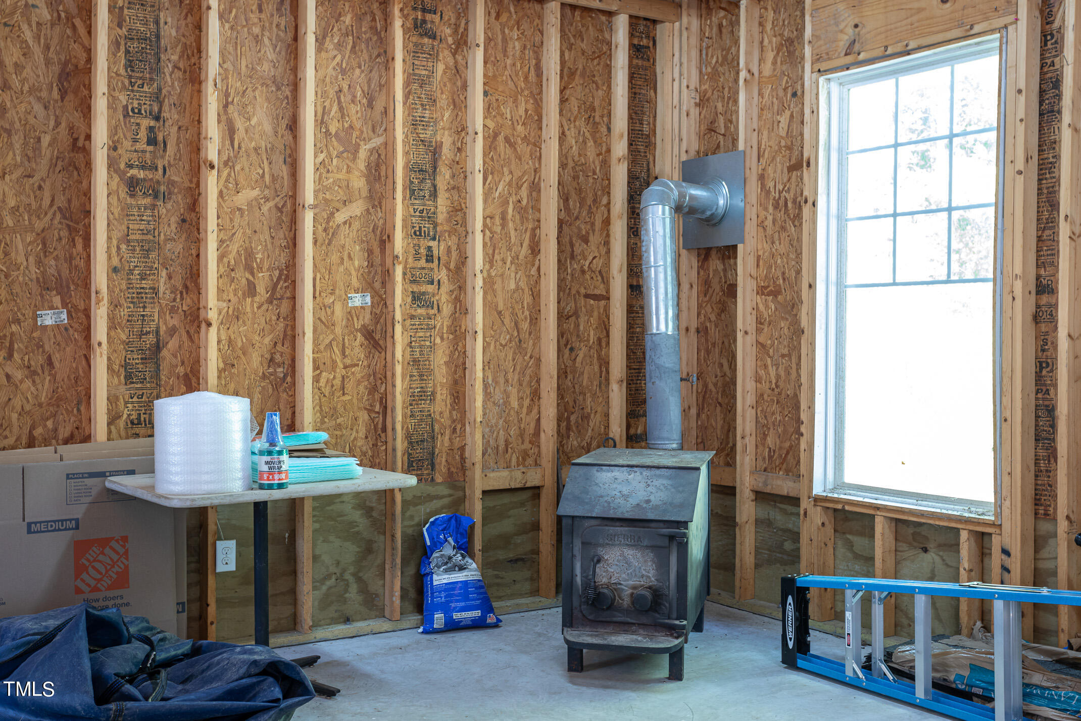 1141 Fleming Road Creedmoor, NC 27522 - Photo 34 of 45 Garage Wood Burning Stove