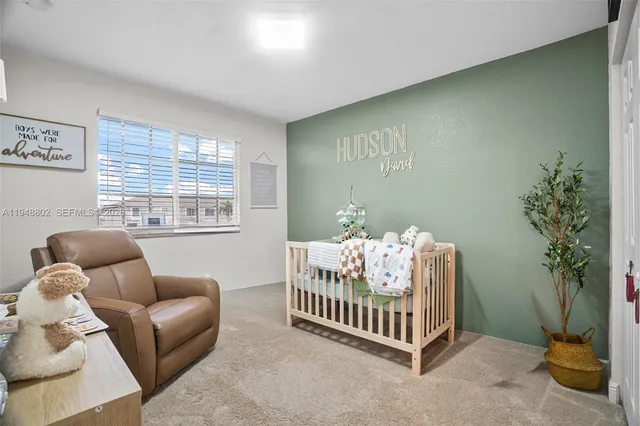 a bed room with furniture and a window