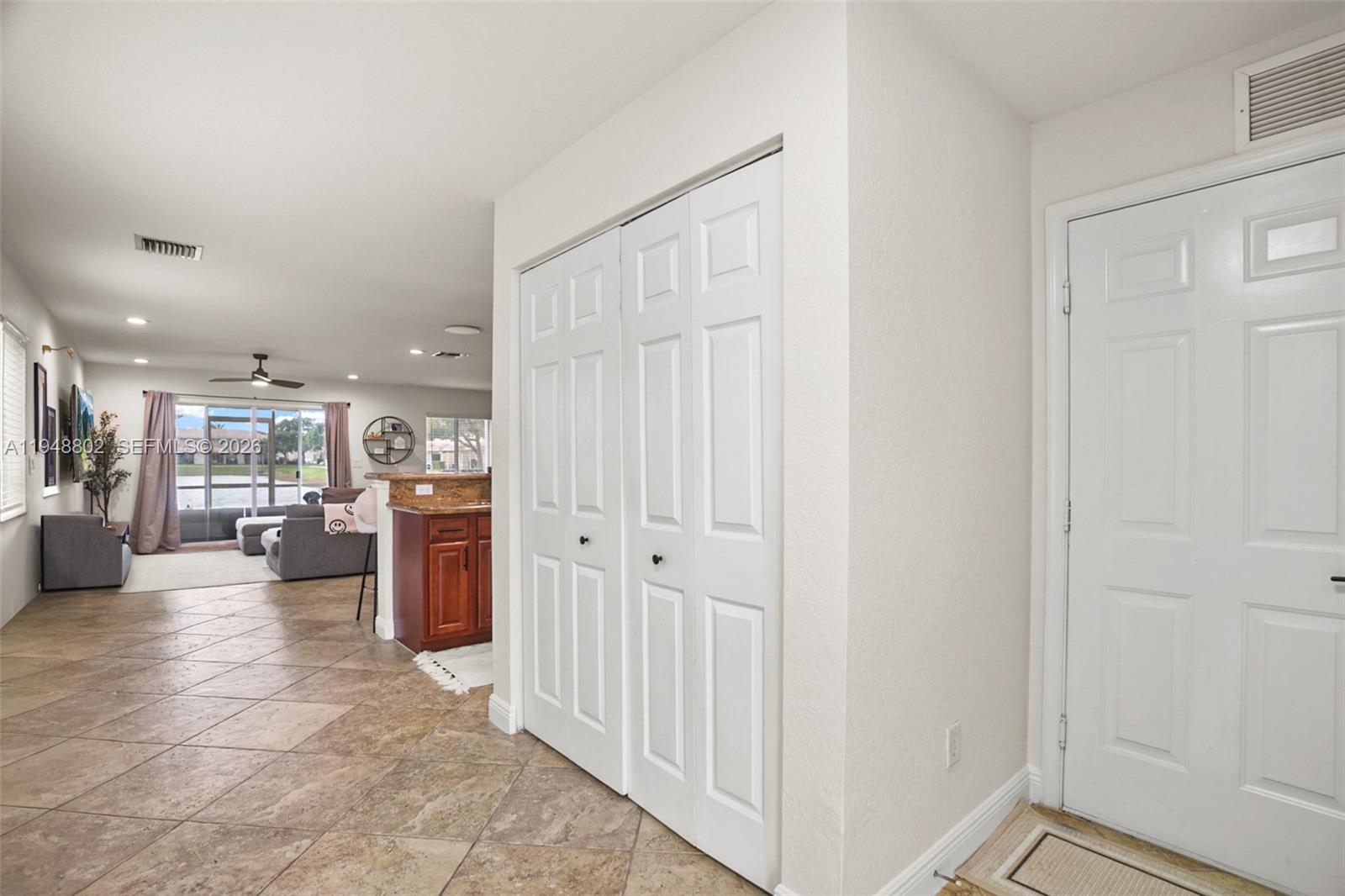 5951 Royal Way Tamarac, FL 33321 - Photo 19 of 33 a view of a livingroom with furniture and a window