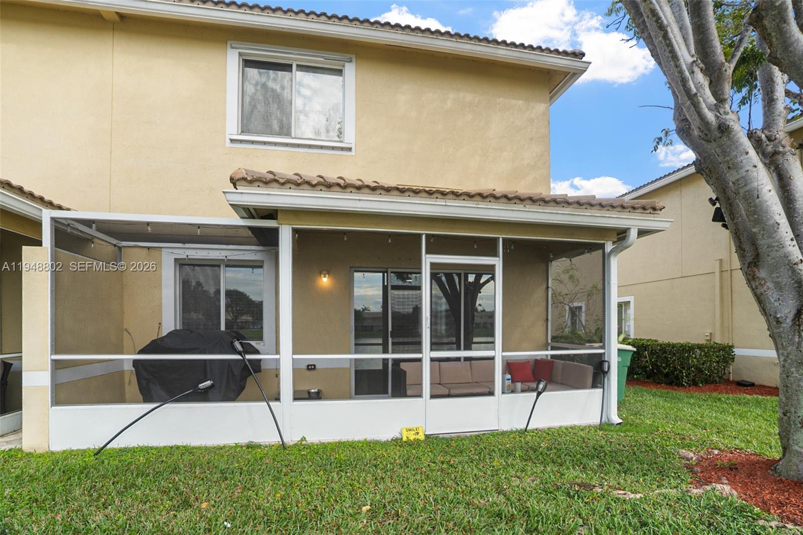 5951 Royal Way Tamarac, FL 33321 - Photo 20 of 33 a view of front door of house with yard