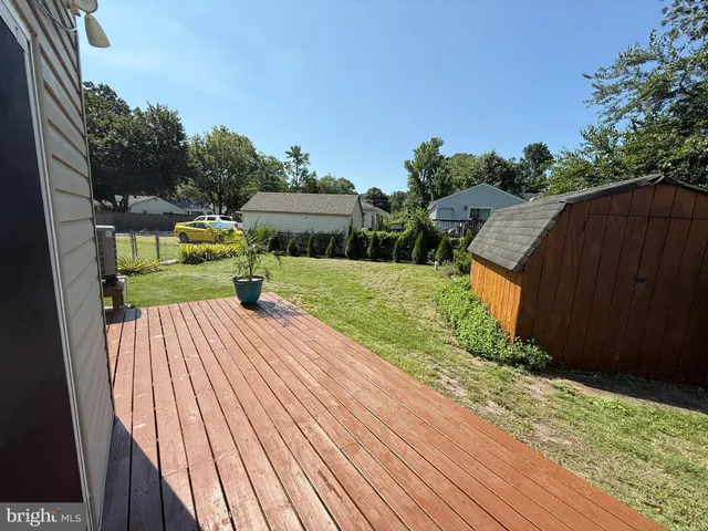 a view of a sign board in the yard