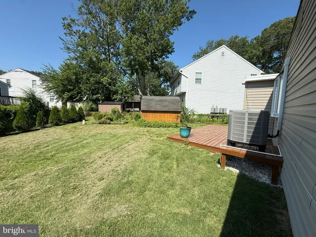 a view of swimming pool with outdoor seating