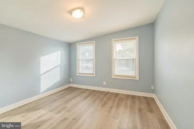 a view of a kitchen with a sink and cabinet area