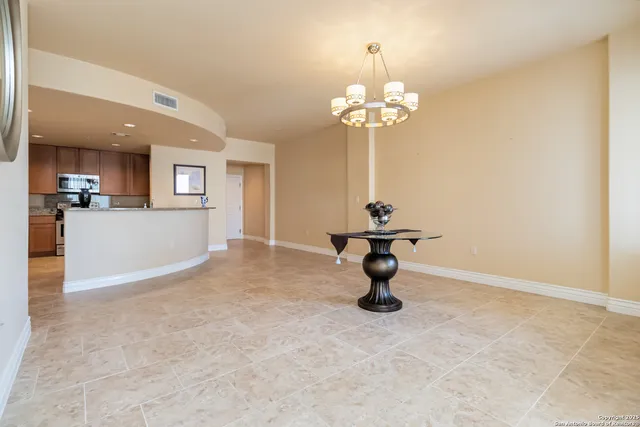 a view of a livingroom with a furniture