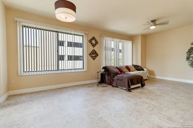 a view of a livingroom with furniture and toys