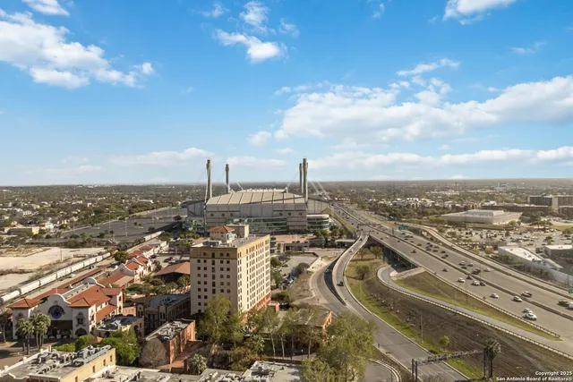 a view of a city with tall buildings