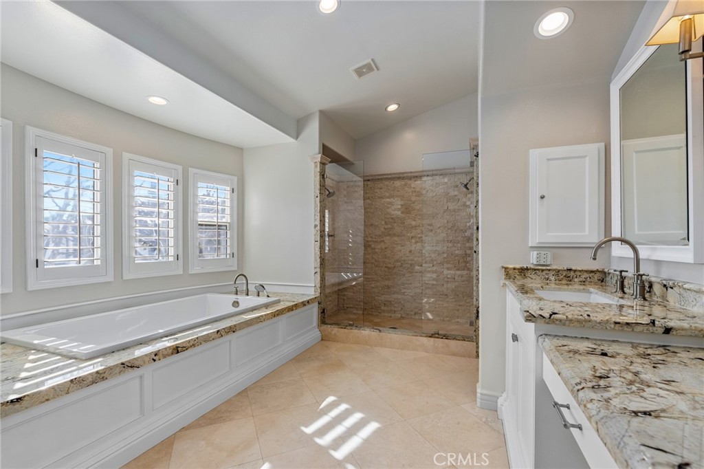 1018 11th Street Manhattan Beach, CA 90266 - Photo 14 of 29 a spacious bathroom with a bathtub and a sink