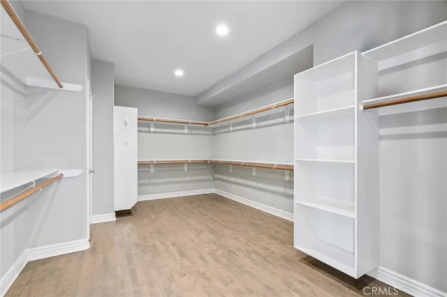 a view of an empty walk in closet