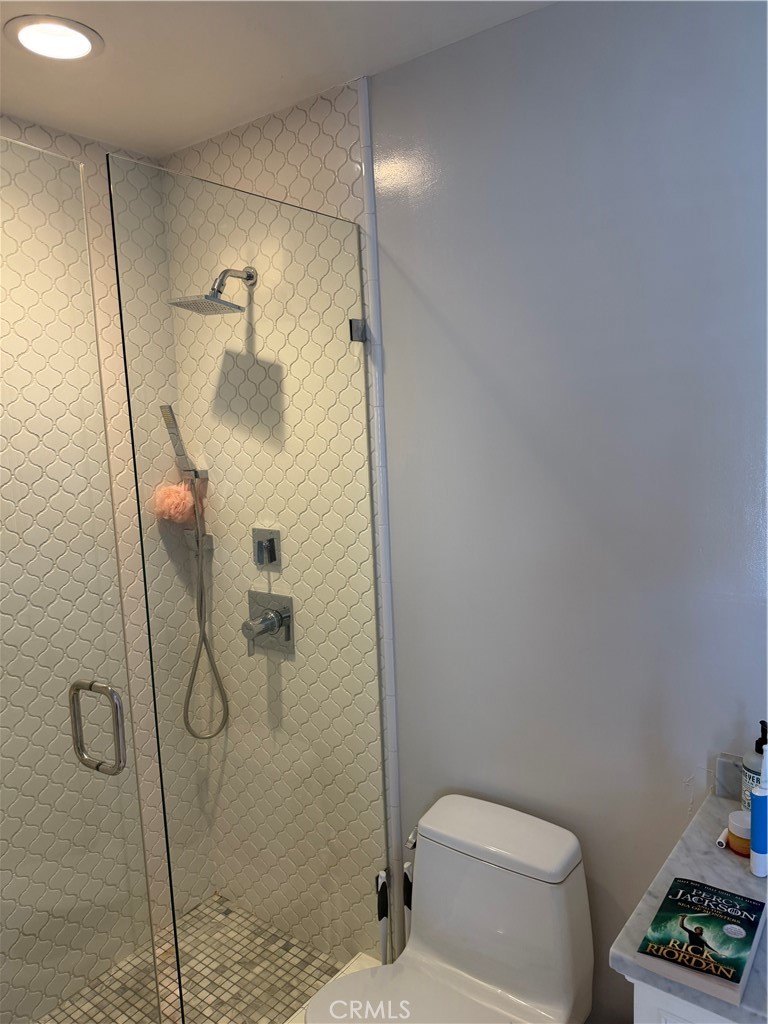 1018 11th Street Manhattan Beach, CA 90266 - Photo 17 of 29 a bathroom with a shower and toilet