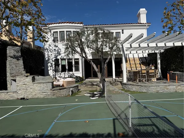 a view of a building with gym equipment and flat screen tv