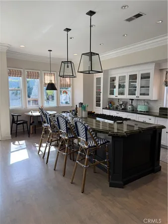 a dinning table and chairs in a room