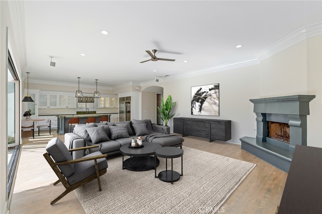 1018 11th Street Manhattan Beach, CA 90266 - Photo 7 of 29 a living room with furniture and a fireplace