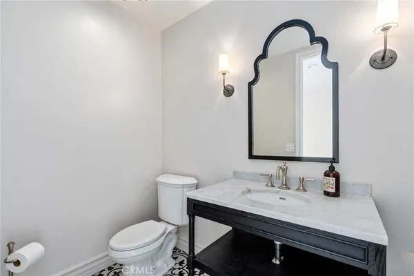 a bathroom with a sink and a toilet