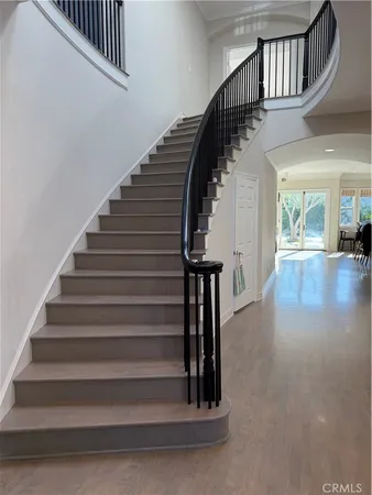 a view of entryway with wooden floor