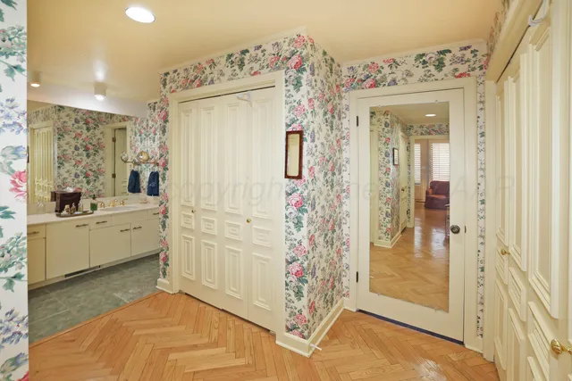 a bathroom with a tub sink and shower
