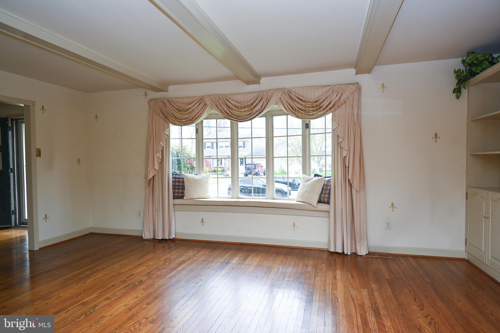 1713 Red Oak Road Williamstown, NJ 08094 - Photo 13 of 76 an empty room with wooden floor and windows