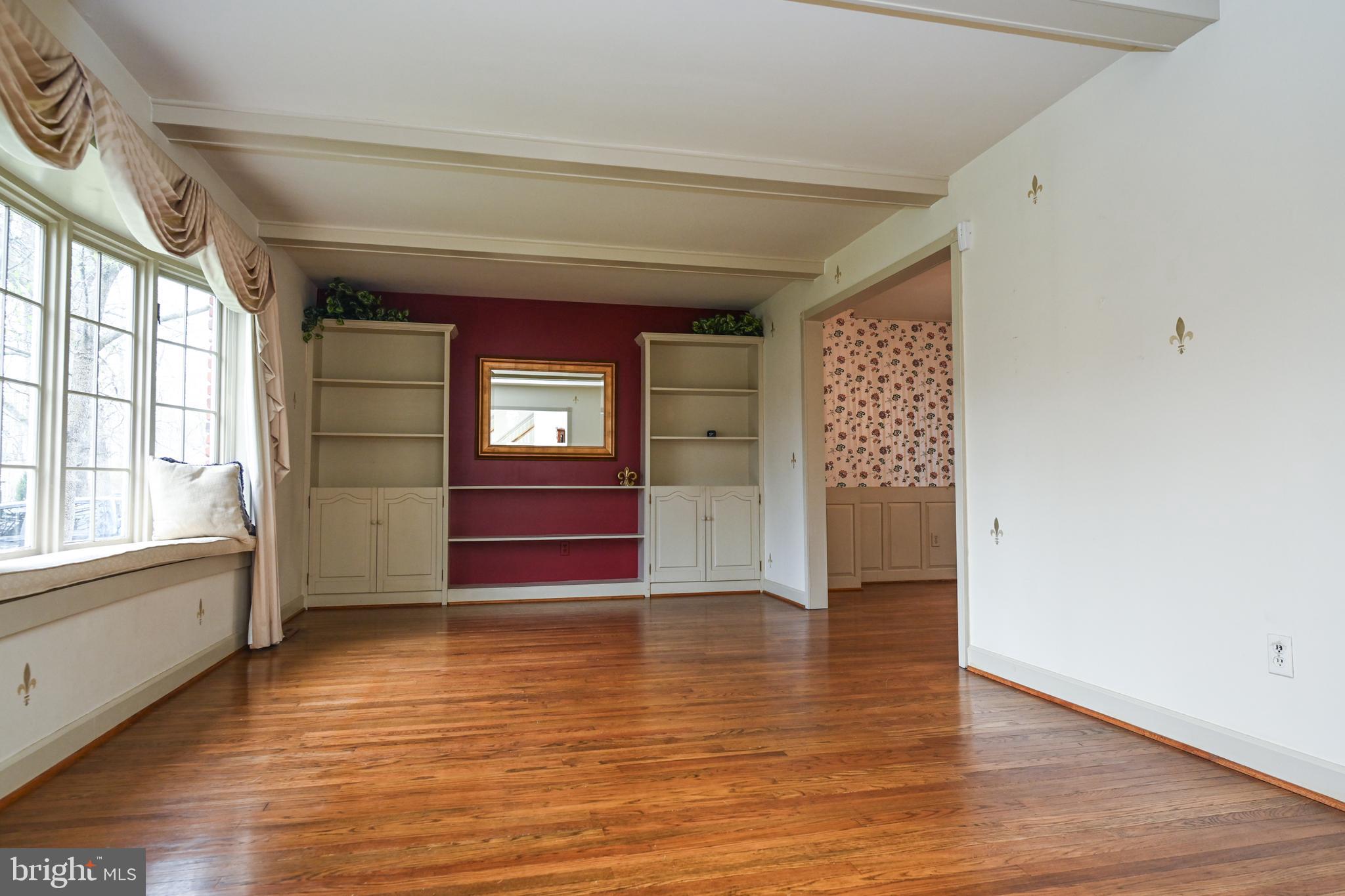 1713 Red Oak Road Williamstown, NJ 08094 - Photo 14 of 76 a view of an empty room with wooden floor and a window