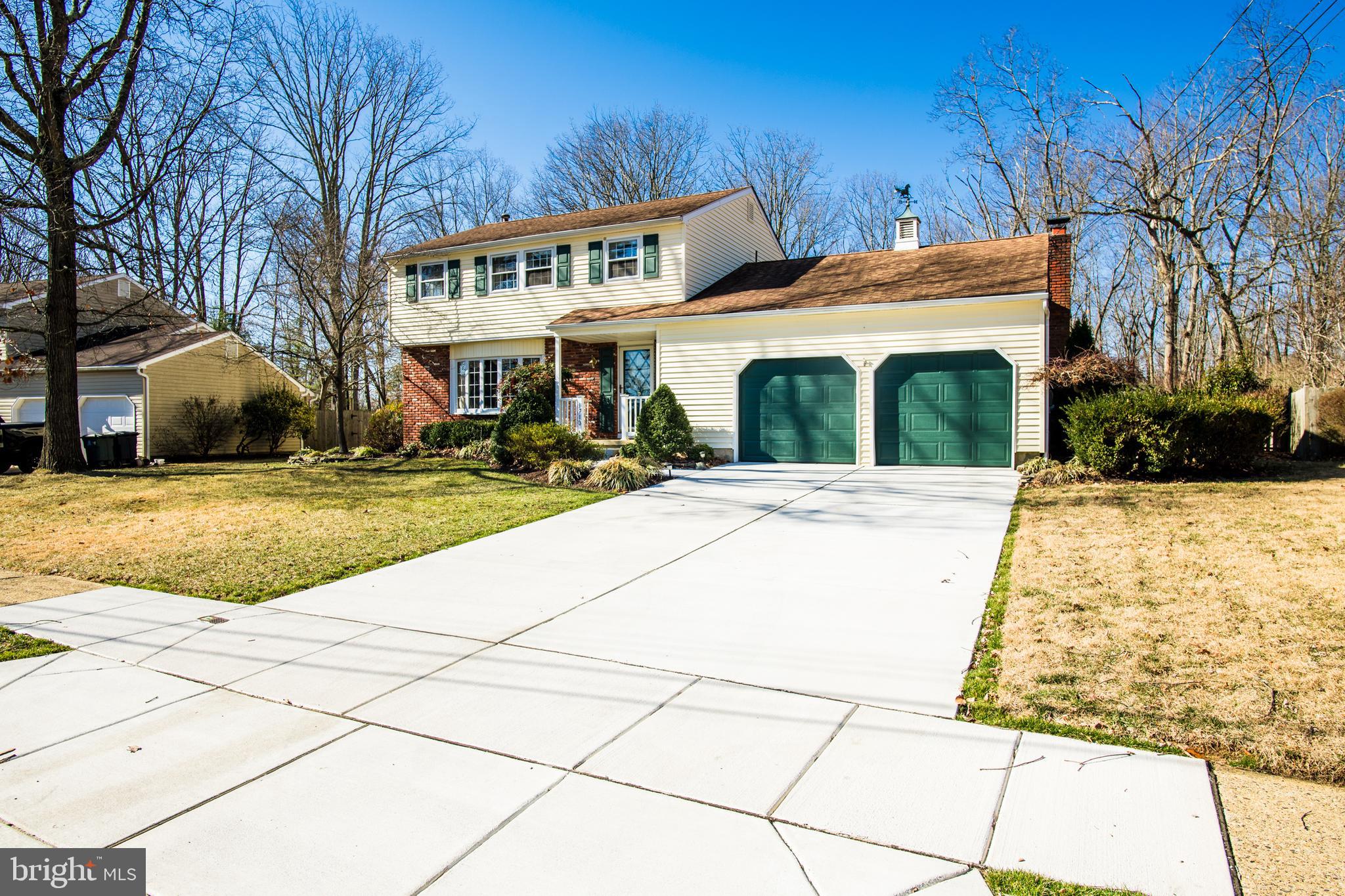1713 Red Oak Road Williamstown, NJ 08094 - Photo 2 of 76 a view of a white house with a yard