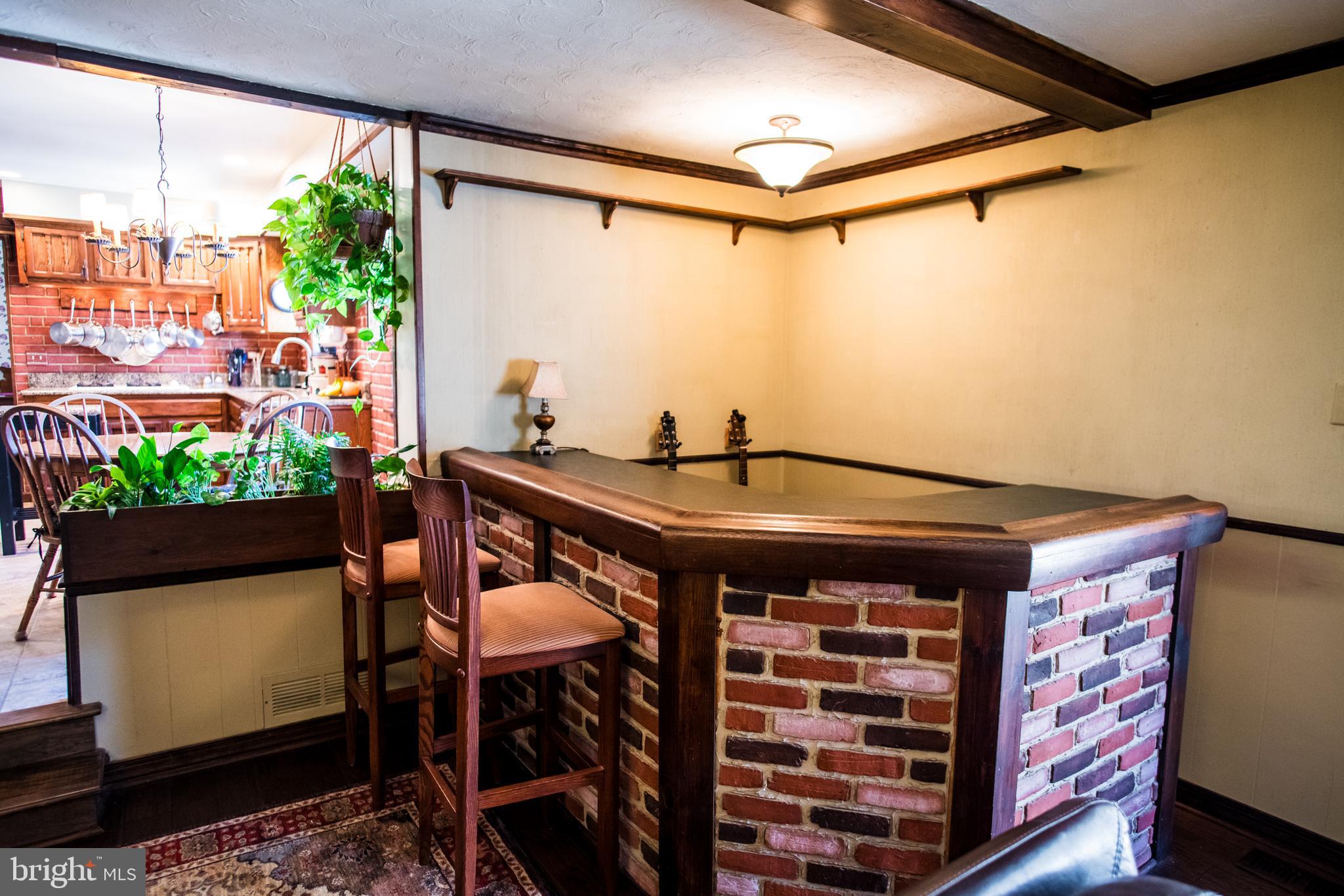 1713 Red Oak Road Williamstown, NJ 08094 - Photo 23 of 76 a room with a table and chairs