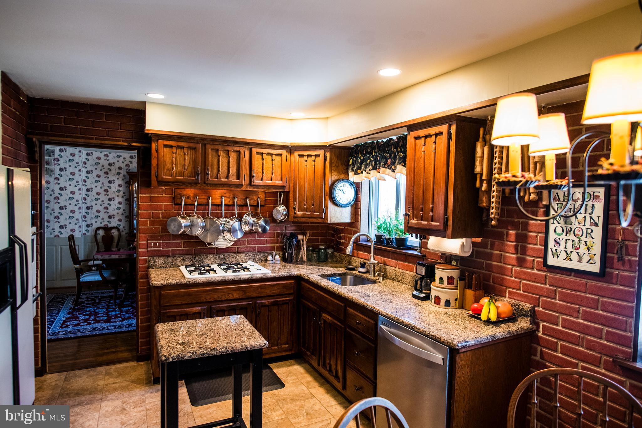 1713 Red Oak Road Williamstown, NJ 08094 - Photo 26 of 76 a kitchen that has a lot of cabinets in it