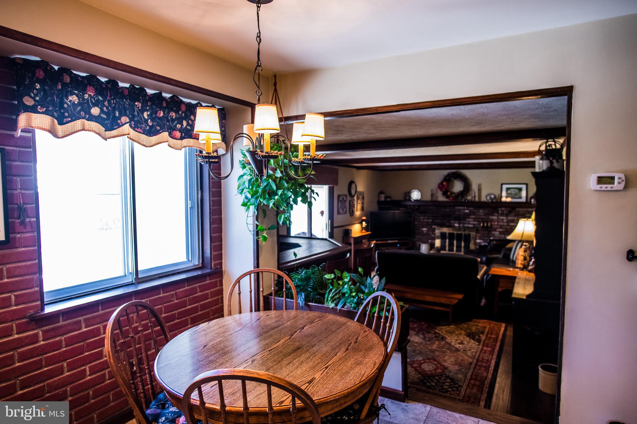 1713 Red Oak Road Williamstown, NJ 08094 - Photo 27 of 76 a view of a dining room with furniture and chandelier