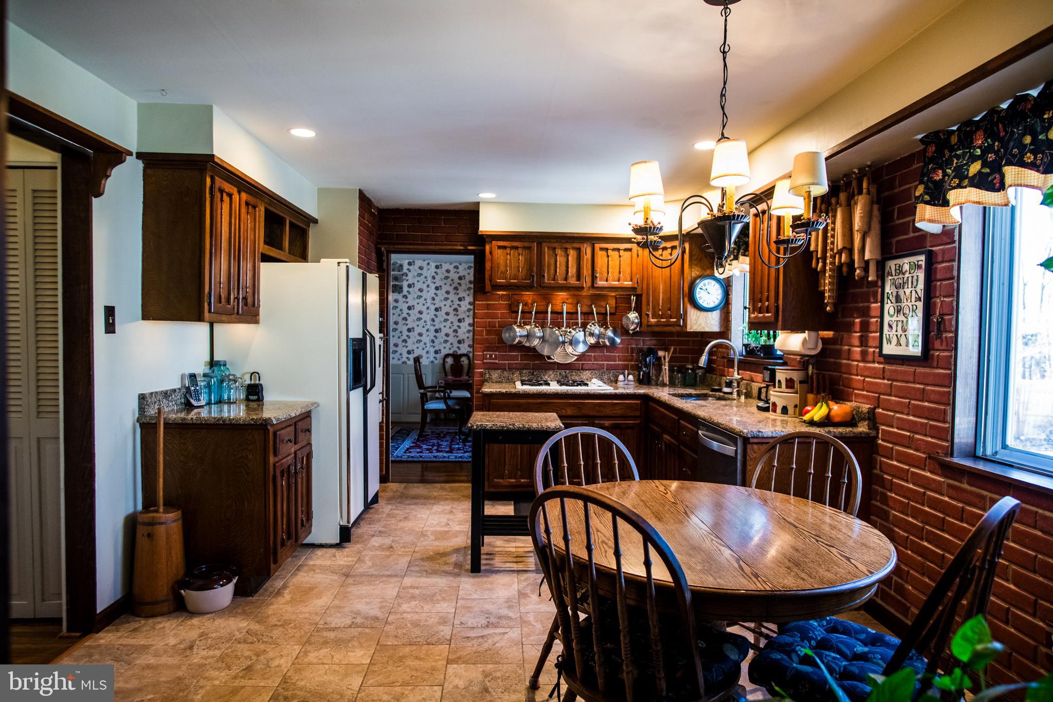 1713 Red Oak Road Williamstown, NJ 08094 - Photo 33 of 76 a view of a dining room with furniture window and wooden floor