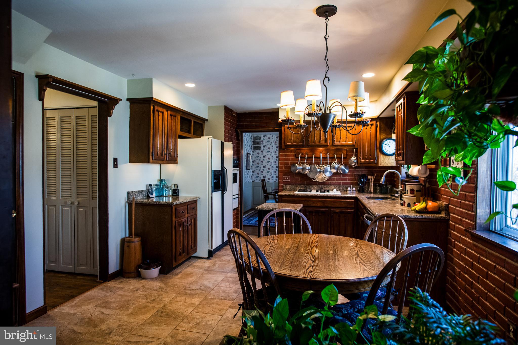 1713 Red Oak Road Williamstown, NJ 08094 - Photo 34 of 76 a view of a dining room with furniture and chandelier
