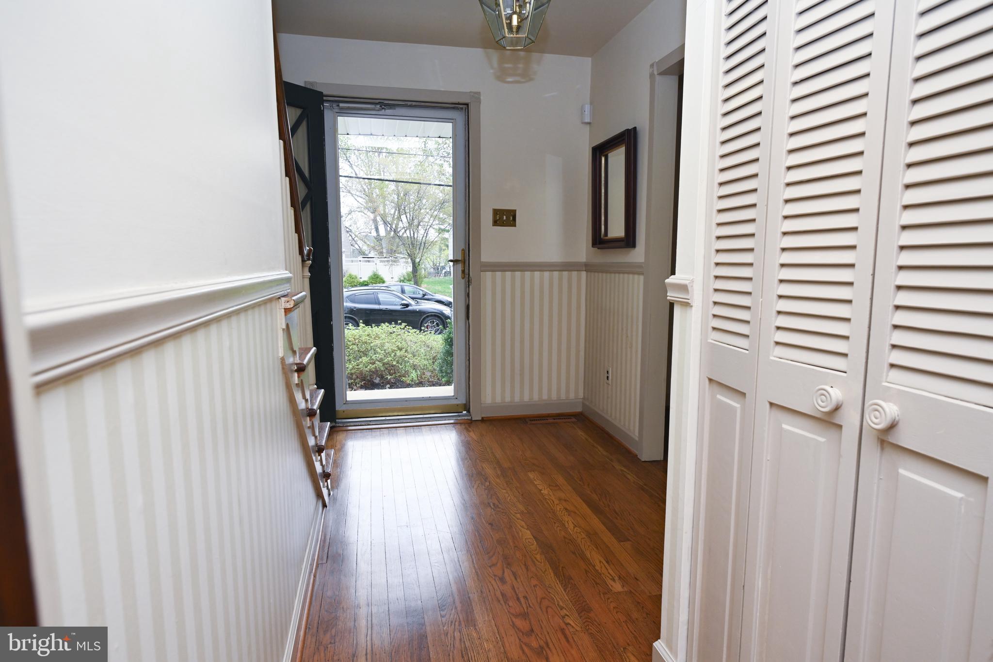 1713 Red Oak Road Williamstown, NJ 08094 - Photo 35 of 76 a view of a hallway with wooden floor and windows