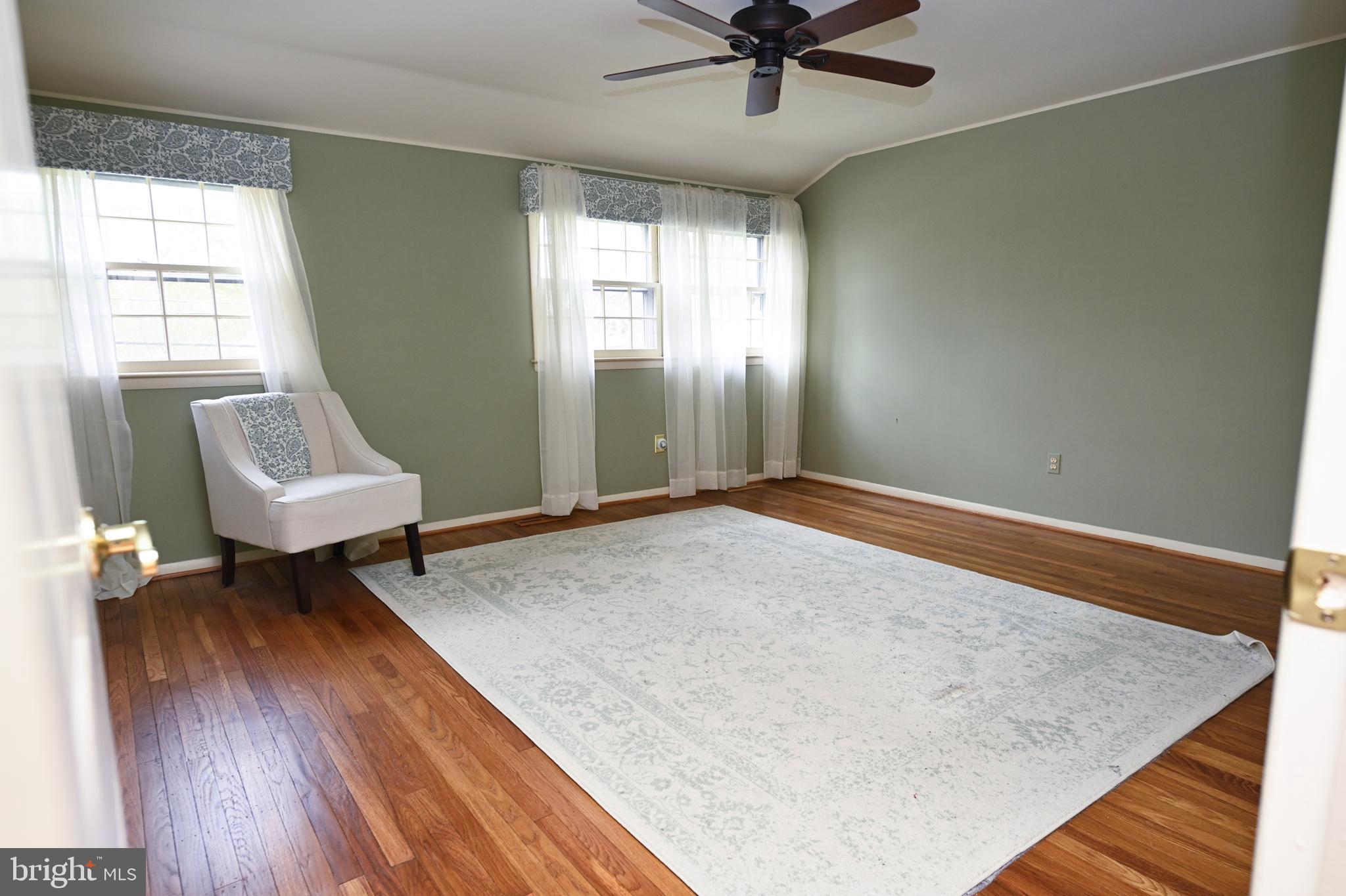 1713 Red Oak Road Williamstown, NJ 08094 - Photo 38 of 76 a living room with a bed furniture and a window