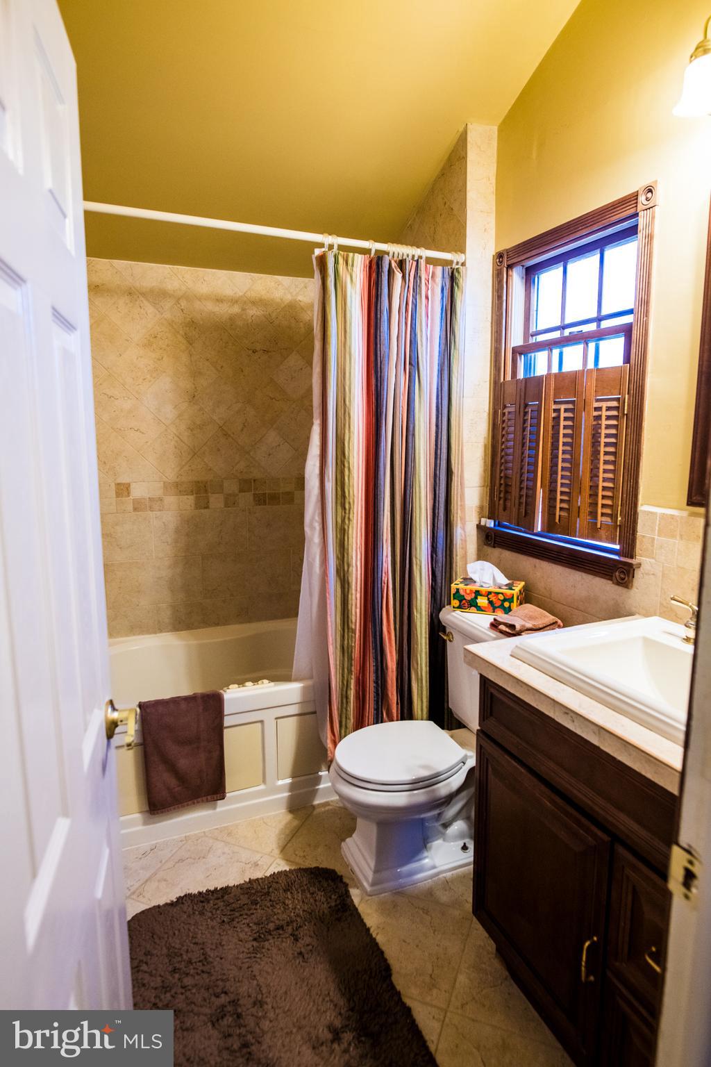 1713 Red Oak Road Williamstown, NJ 08094 - Photo 40 of 76 a bathroom with a sink toilet and shower