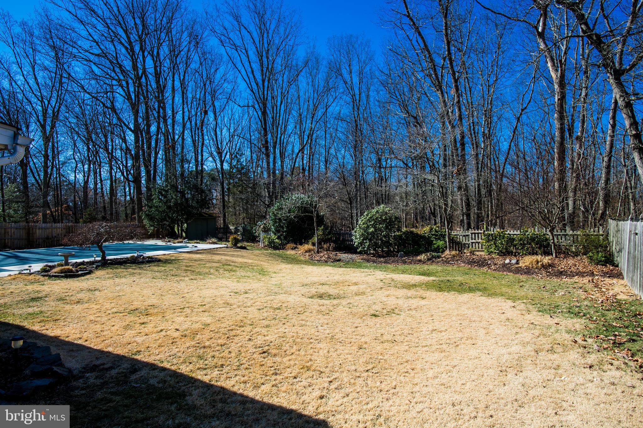 1713 Red Oak Road Williamstown, NJ 08094 - Photo 63 of 76 a view of a swimming pool with an outdoor space and seating area