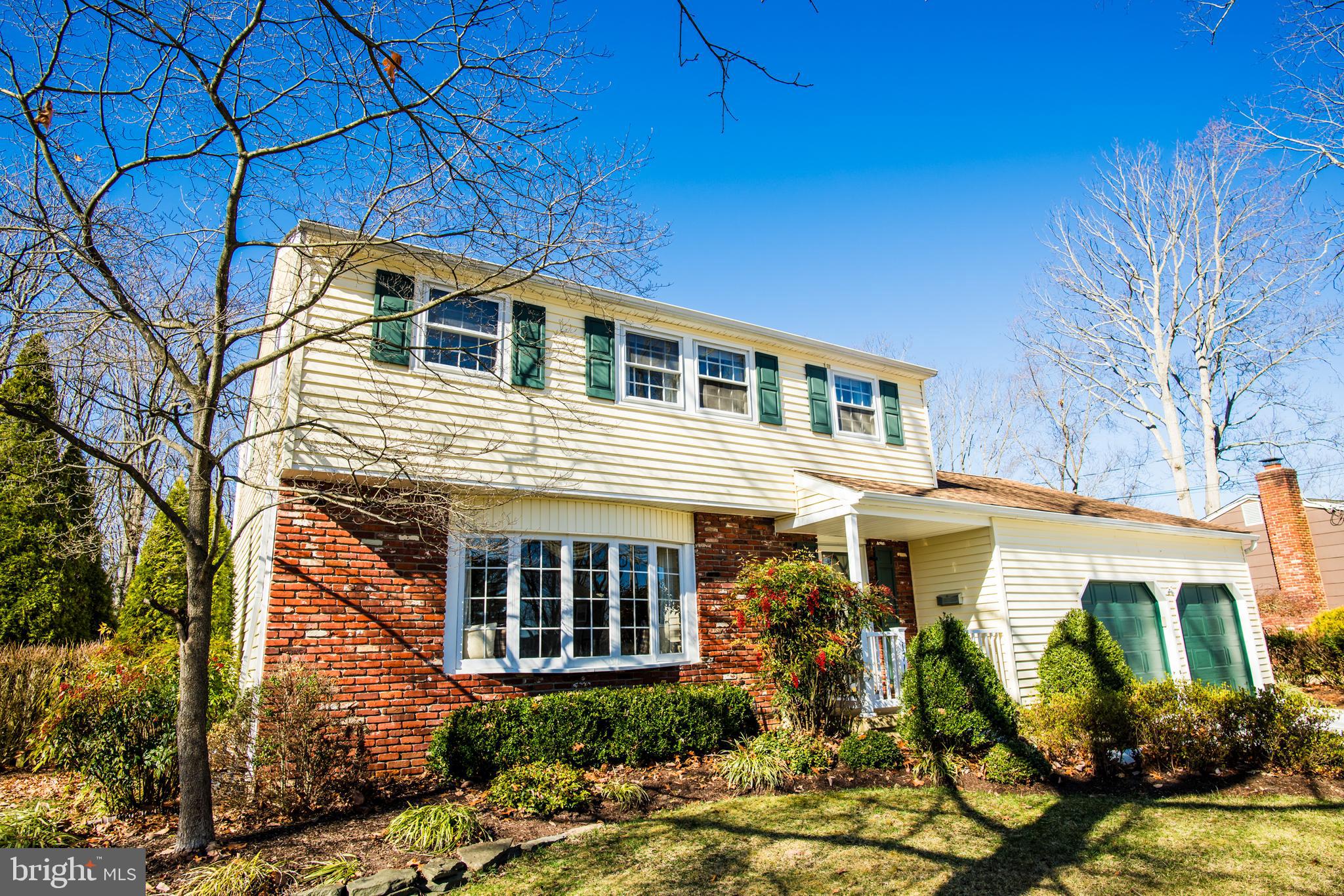 1713 Red Oak Road Williamstown, NJ 08094 - Photo 69 of 76 a front view of a house with garden