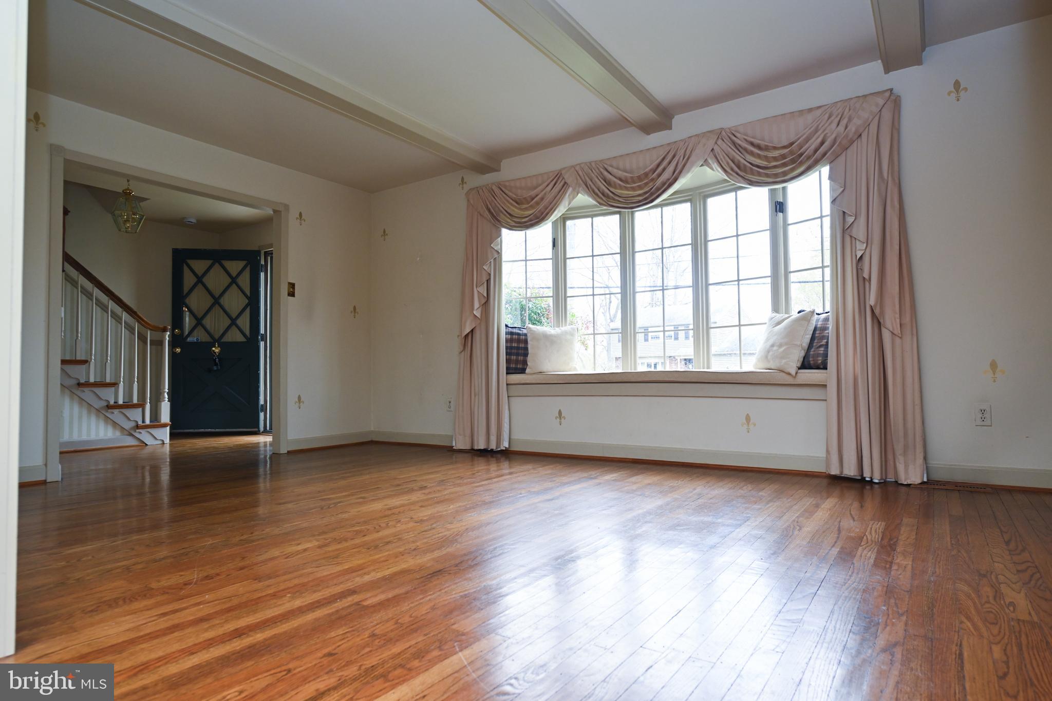 1713 Red Oak Road Williamstown, NJ 08094 - Photo 9 of 76 a view of an empty room with wooden floor and a window