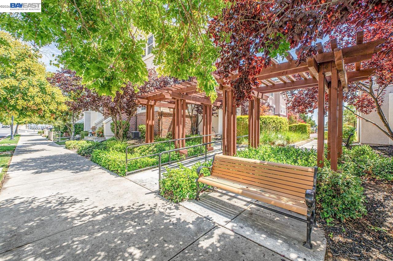 2871 First Street, Unit 901 Livermore, CA 94550 - Photo 44 of 46 a view of a house with a yard and a garden