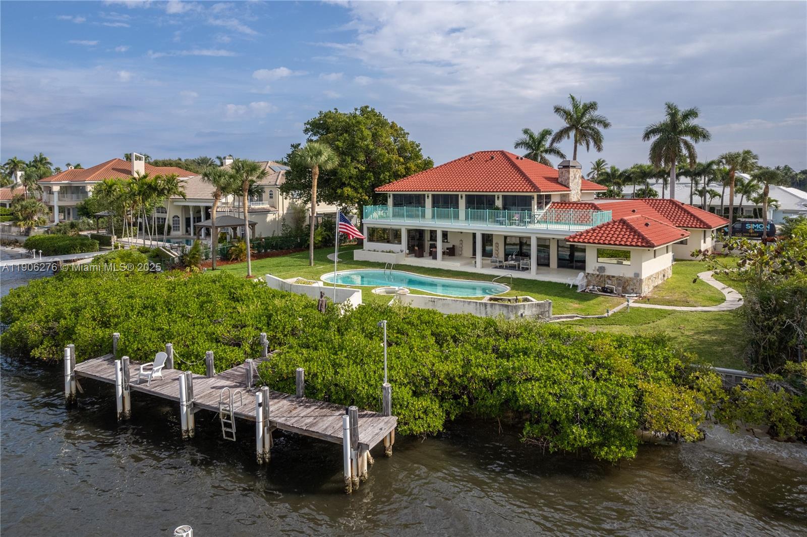 1635 Lands End Road Manalapan, FL 33462 - Photo 11 of 38 a view of a patio with couches table and chairs and potted plants