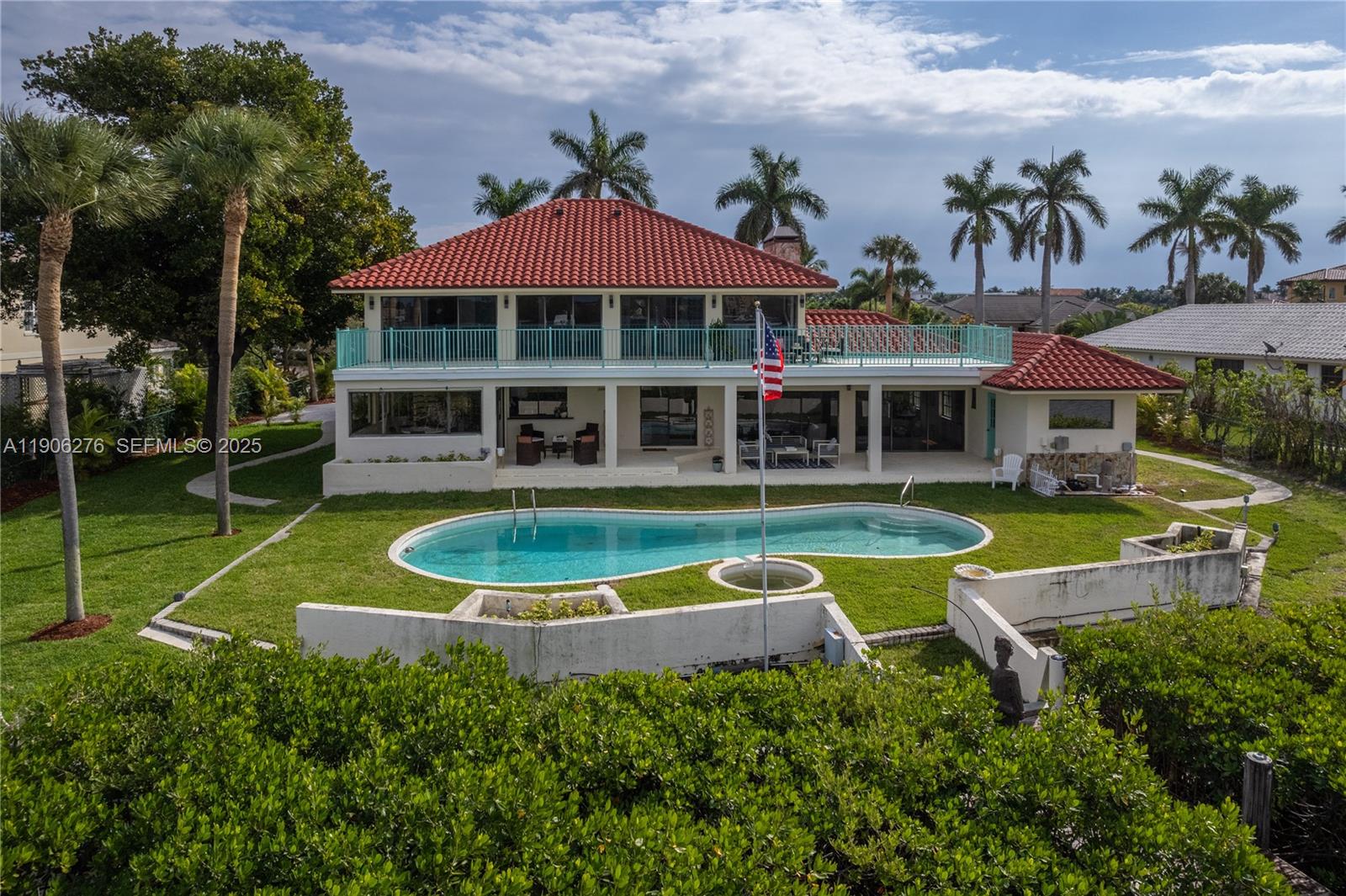 1635 Lands End Road Manalapan, FL 33462 - Photo 15 of 38 an aerial view of a house with a swimming pool