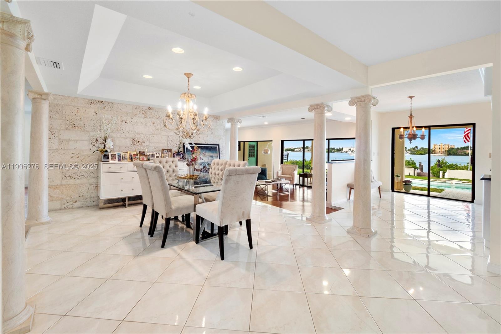 1635 Lands End Road Manalapan, FL 33462 - Photo 16 of 38 a view of a dining area with furniture