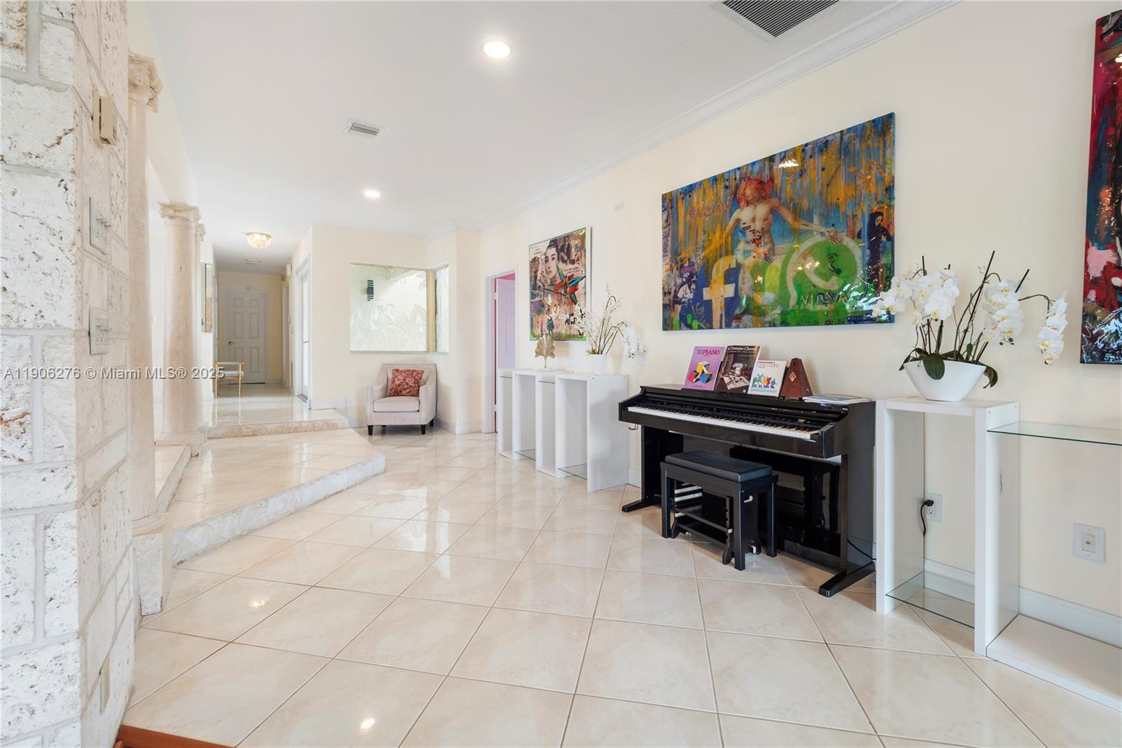 1635 Lands End Road Manalapan, FL 33462 - Photo 23 of 38 a view of a workspace with furniture and a flat screen tv