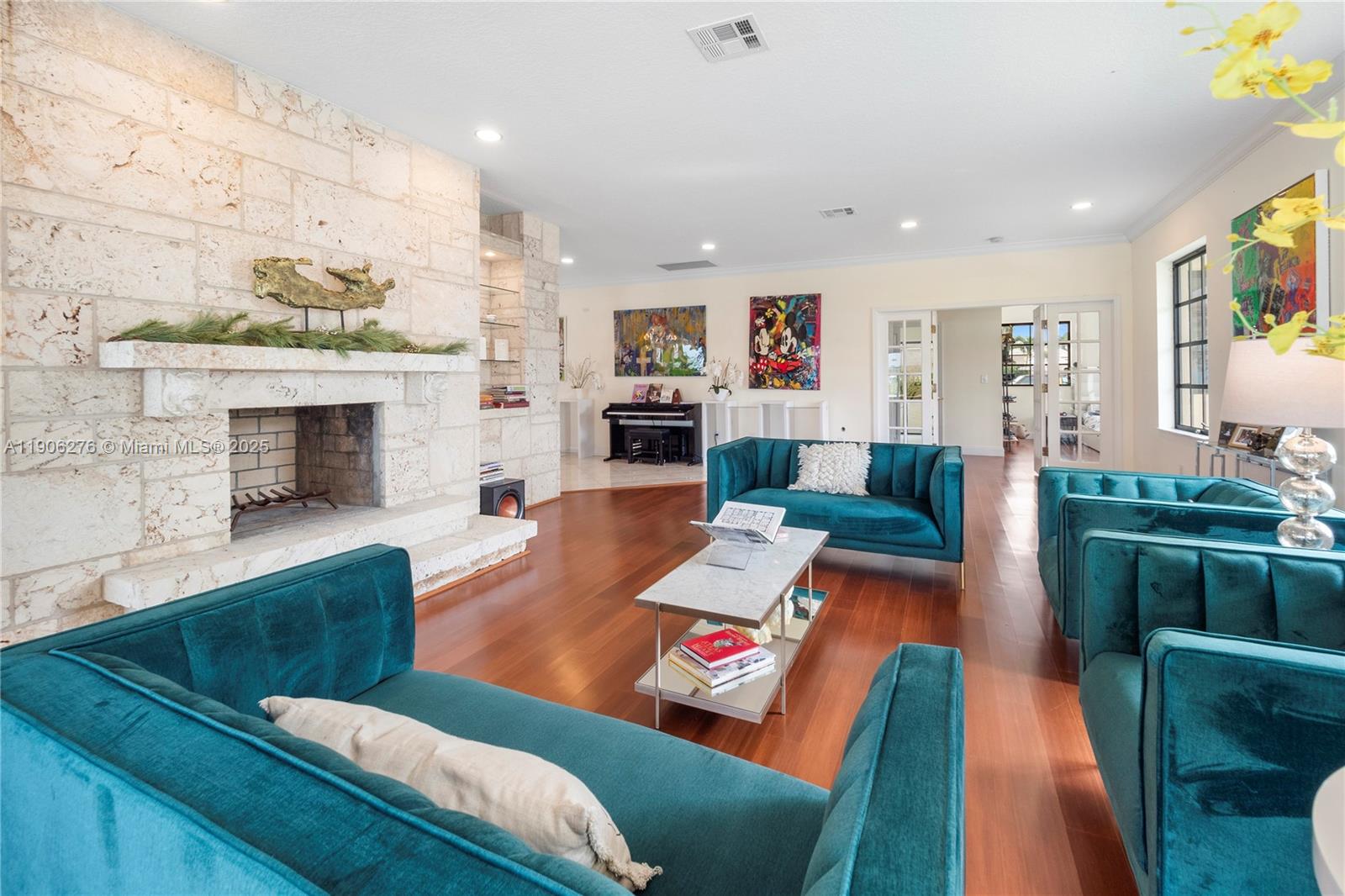 1635 Lands End Road Manalapan, FL 33462 - Photo 26 of 38 a living room with furniture and a fireplace