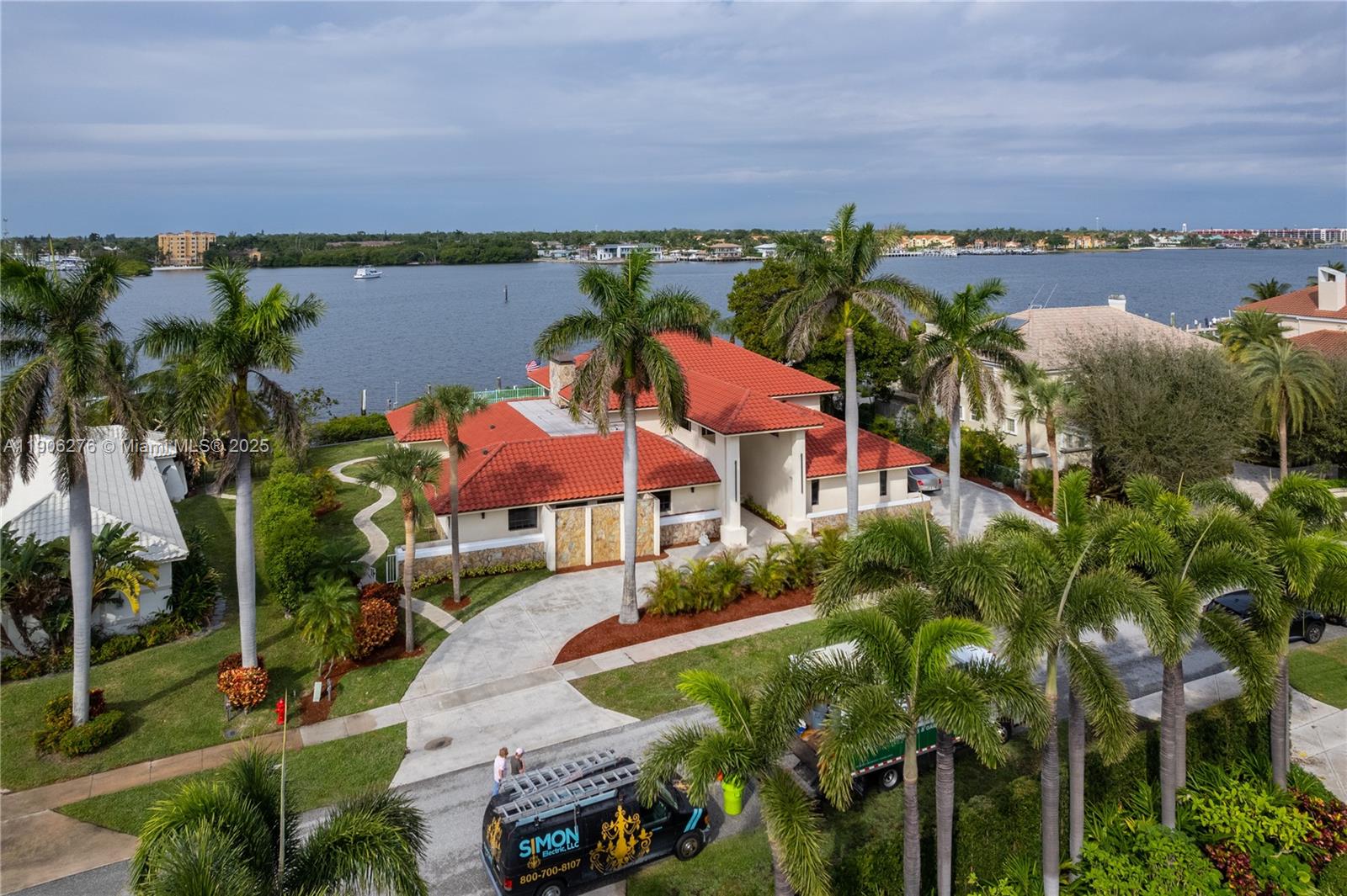 1635 Lands End Road Manalapan, FL 33462 - Photo 3 of 38 an aerial view of a house with a garden and lake view