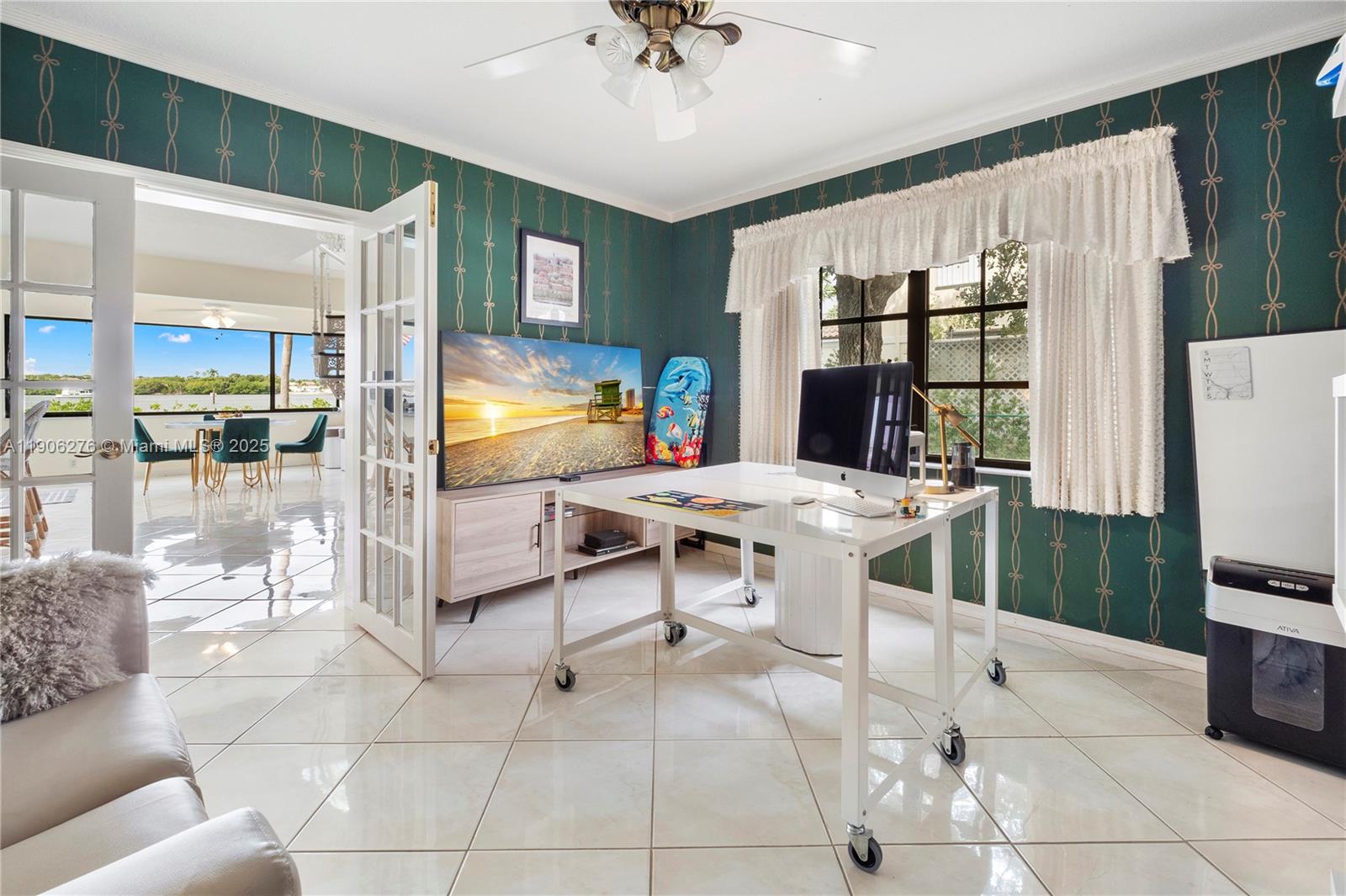1635 Lands End Road Manalapan, FL 33462 - Photo 34 of 38 a view of a livingroom with furniture and a flat screen tv