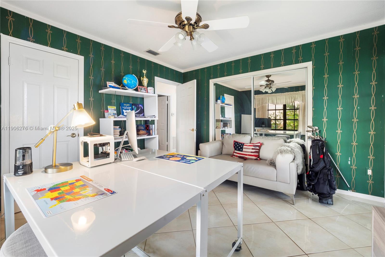 1635 Lands End Road Manalapan, FL 33462 - Photo 35 of 38 a living room with lots of furniture and a chandelier