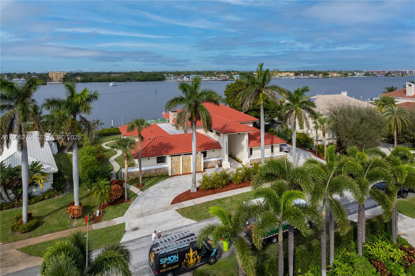1635 Lands End Road Manalapan, FL 33462 - Photo 4 of 38 an aerial view of a house with a garden and lake view
