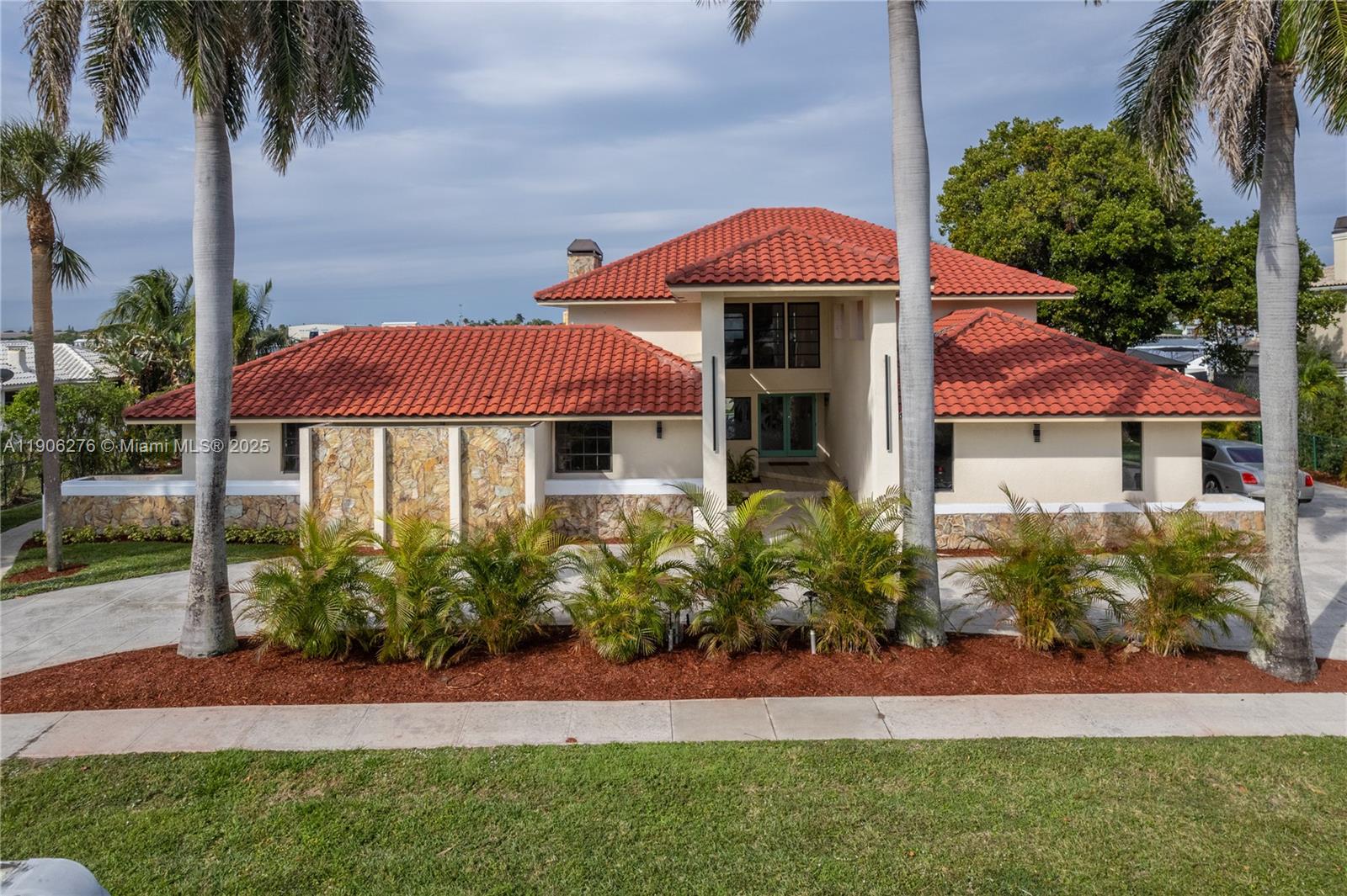1635 Lands End Road Manalapan, FL 33462 - Photo 7 of 38 a view of a house with a yard and sitting area