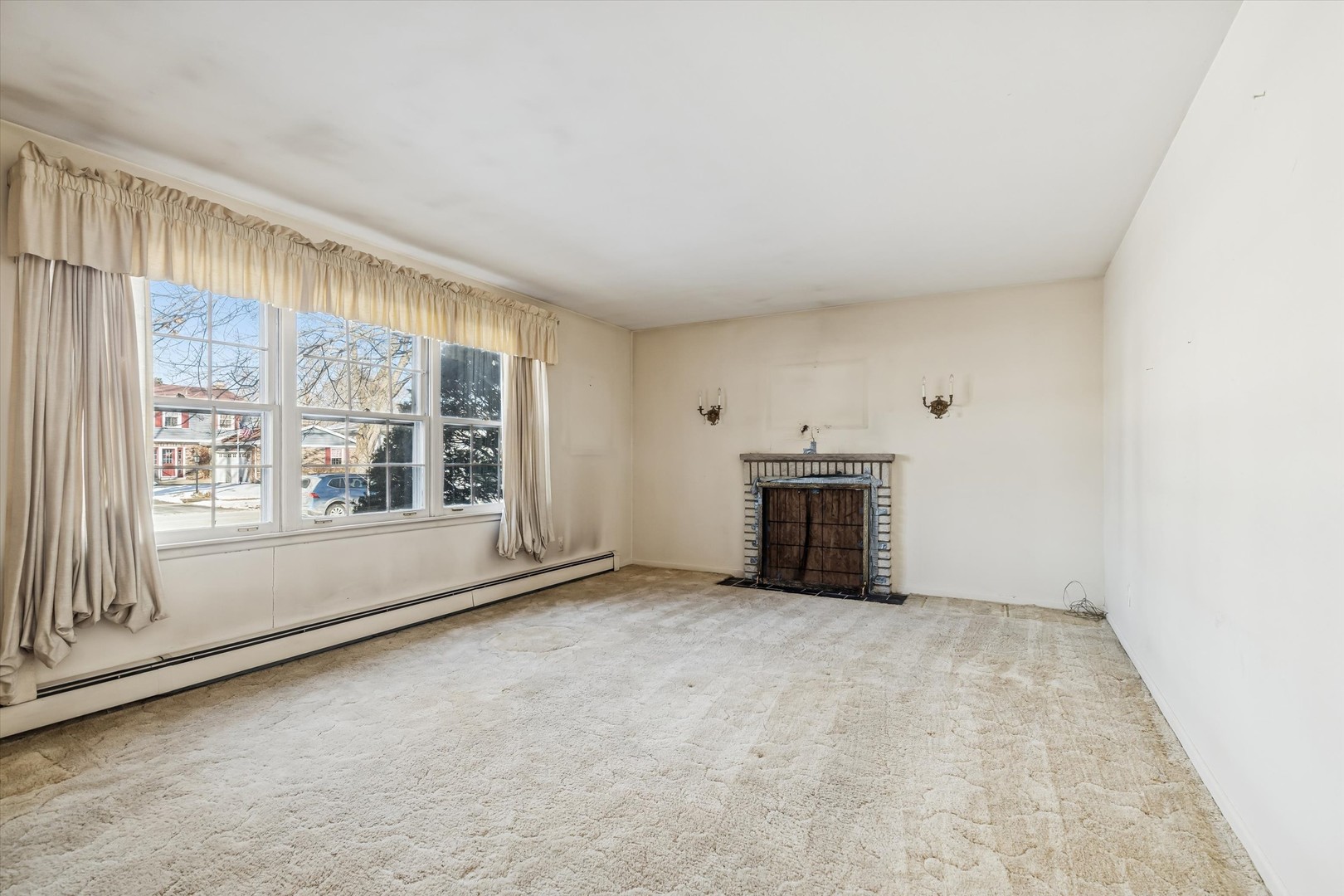 47 Sunset Drive Cary, IL 60013 - Photo 4 of 19 an empty room with windows