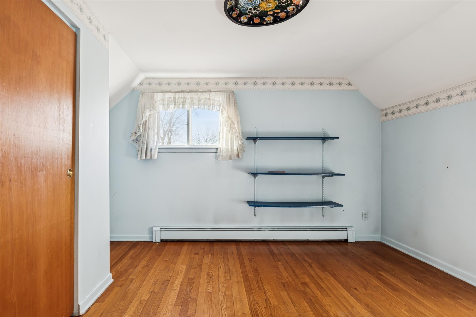 47 Sunset Drive Cary, IL 60013 - Photo 9 of 19 a view of entryway with wooden floor