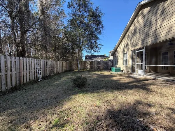 a view of backyard of house