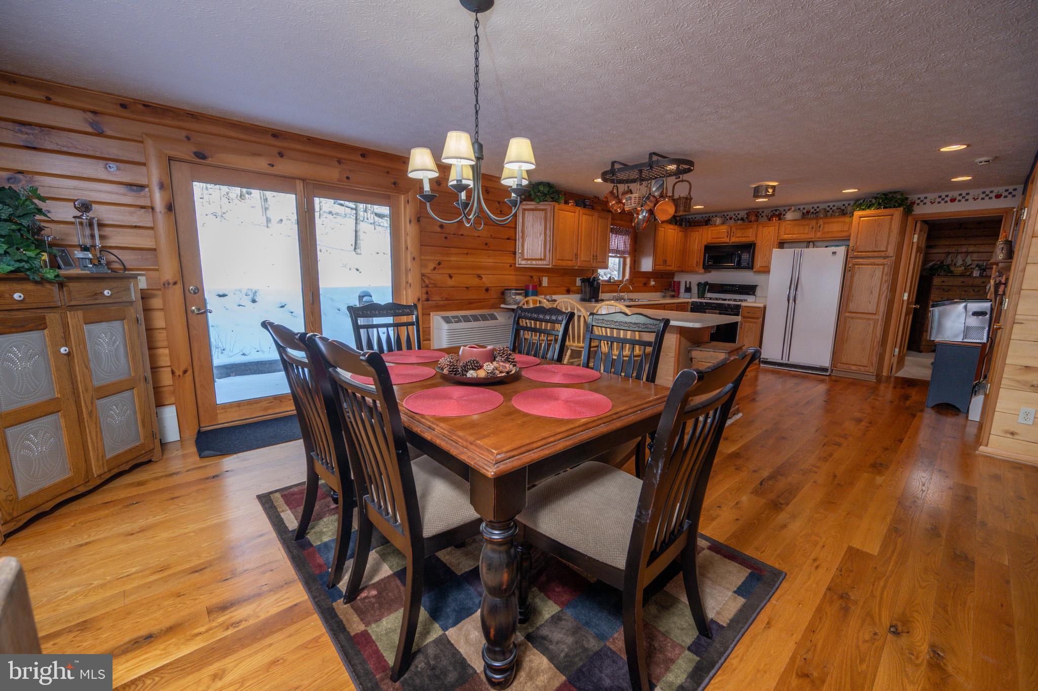 542 Bench Road Swanton, MD 21561 - Photo 14 of 59 Easy access to back patio dining