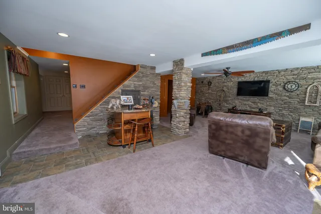 a bedroom with a bed and a mirror