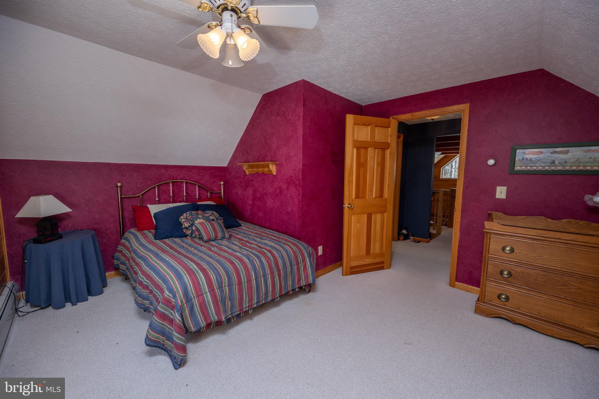 542 Bench Road Swanton, MD 21561 - Photo 39 of 59 Upstairs bedroom area with tons of light